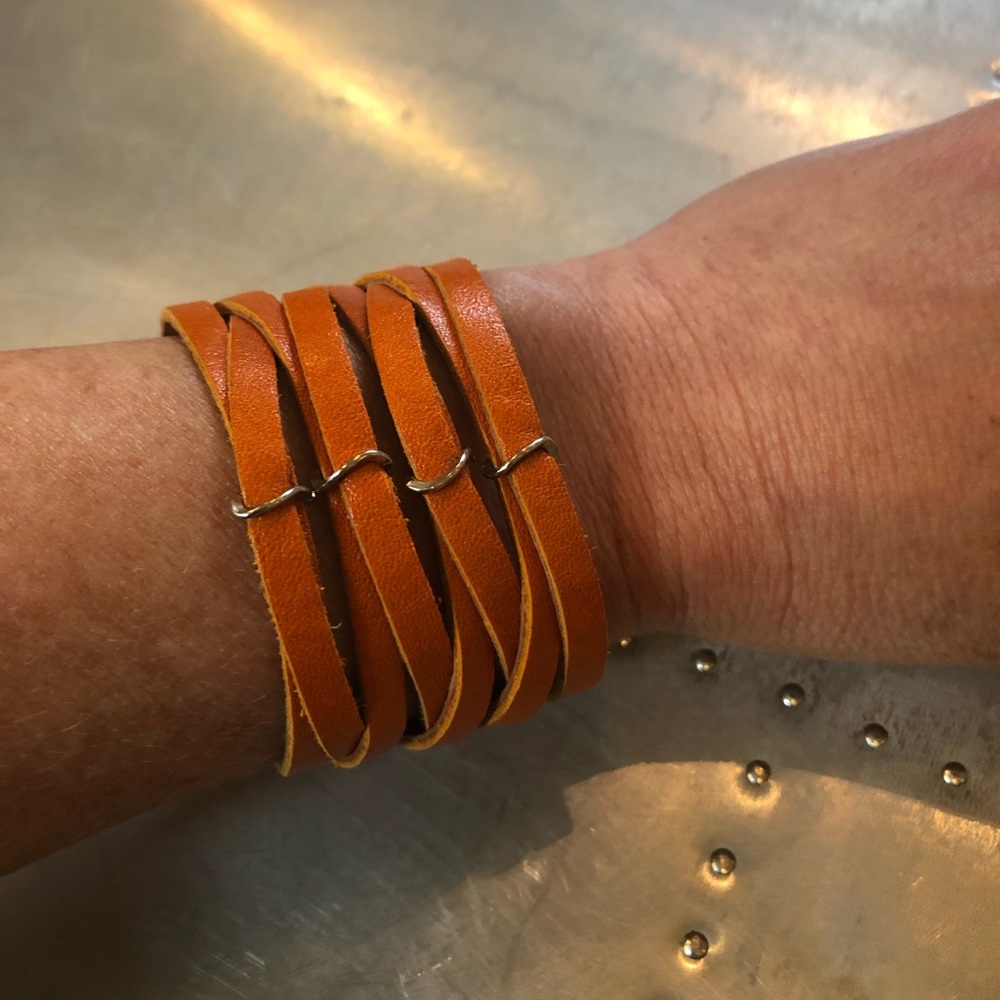 Orange leather cuff, handmade.